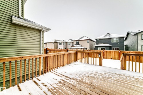 Wooden deck featuring a residential view - 5110 23A Avenue, Edmonton, AB - Outdoor With Deck Patio Veranda With Exterior