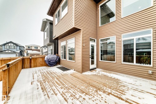 Wooden deck with area for grilling and a residential view - 5110 23A Avenue, Edmonton, AB - Outdoor With Deck Patio Veranda