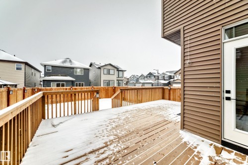 Wooden terrace featuring a residential view - 5110 23A Avenue, Edmonton, AB - Outdoor With Deck Patio Veranda With Exterior