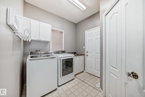 Laundry room on main floor. - 170 Blackburn Drive W, Edmonton, AB - Indoor Photo Showing Laundry Room