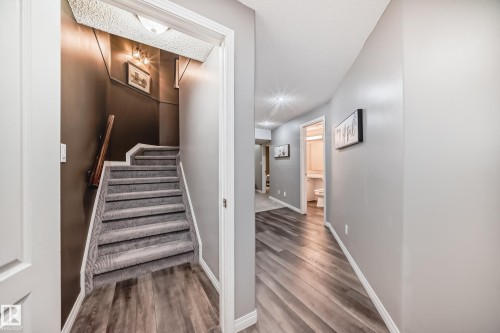 Stairs leading up from basement. - 170 Blackburn Drive W, Edmonton, AB - Indoor Photo Showing Other Room