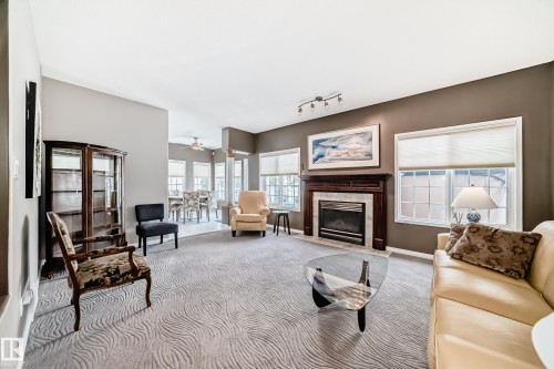 170 Blackburn Drive W, Edmonton, AB - Indoor Photo Showing Living Room With Fireplace