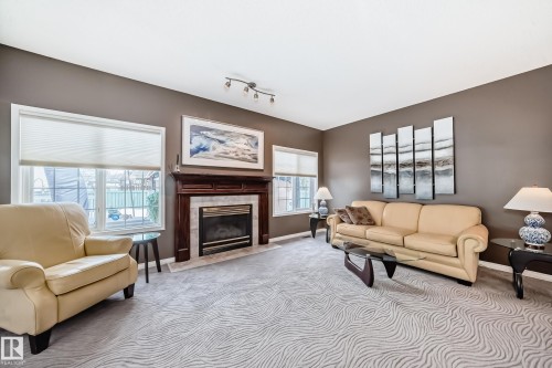 170 Blackburn Drive W, Edmonton, AB - Indoor Photo Showing Living Room With Fireplace