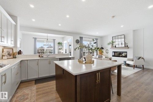 1525 Darby Bay, Edmonton, AB - Indoor Photo Showing Kitchen With Fireplace