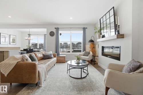 1525 Darby Bay, Edmonton, AB - Indoor Photo Showing Living Room With Fireplace
