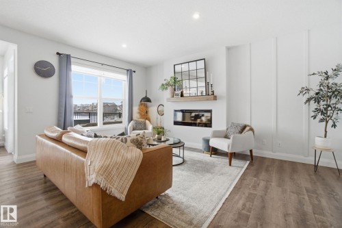 1525 Darby Bay, Edmonton, AB - Indoor Photo Showing Living Room With Fireplace