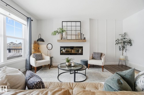 1525 Darby Bay, Edmonton, AB - Indoor Photo Showing Living Room With Fireplace