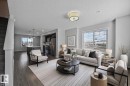 Virtually staged - 34 2215 24 Street, Edmonton, AB  - Indoor Photo Showing Living Room 