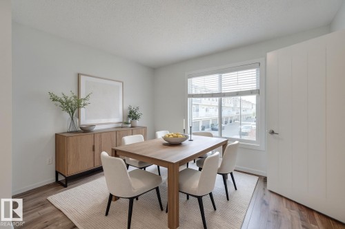 Virtually staged - 26 2215 24 Street, Edmonton, AB - Indoor Photo Showing Dining Room