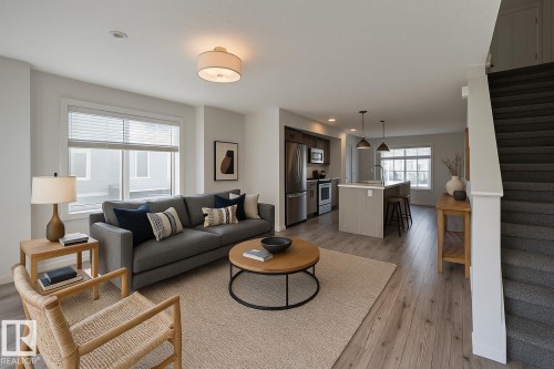 Virtually staged - 26 2215 24 Street, Edmonton, AB - Indoor Photo Showing Living Room