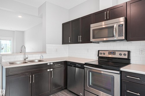 30 804 Welsh Drive, Edmonton, AB - Indoor Photo Showing Kitchen With Double Sink