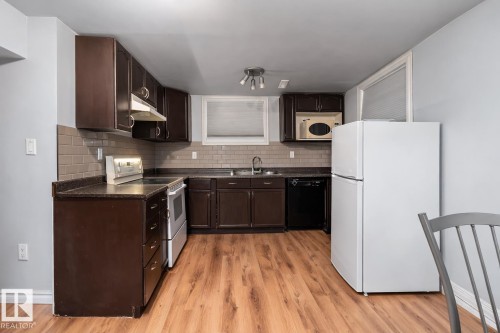 10919 116 Street, Edmonton, AB - Indoor Photo Showing Kitchen With Double Sink