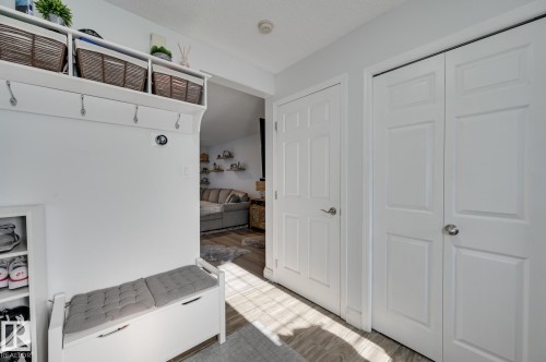 Mudroom featuring light wood finished floors - 59 14803 Miller Boulevard, Edmonton, AB - Indoor Photo Showing Other Room