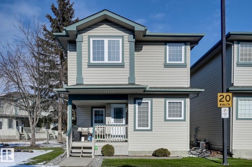 View of front of house featuring a porch - 59 14803 Miller Boulevard, Edmonton, AB - Outdoor With Deck Patio Veranda With Facade