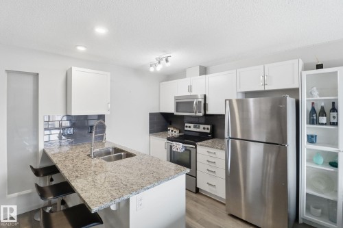 432 390 Windermere Road Nw, Edmonton, AB - Indoor Photo Showing Kitchen With Double Sink With Upgraded Kitchen
