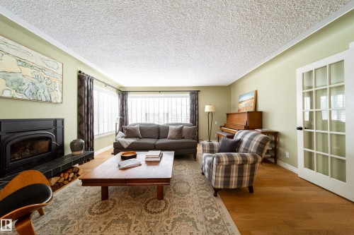 8332 120 Street, Edmonton, AB - Indoor Photo Showing Living Room With Fireplace