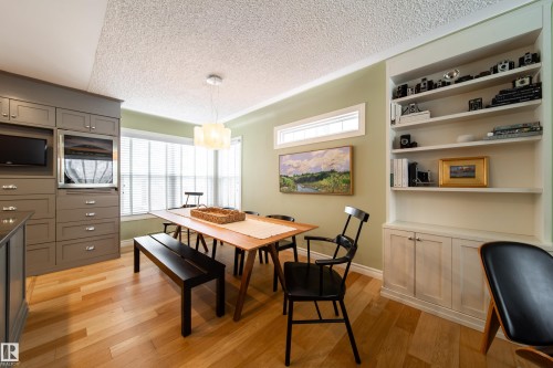 Notice big windows and the  brightness of this  room - 8332 120 Street, Edmonton, AB - Indoor Photo Showing Dining Room