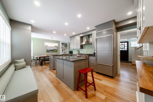 storage under cushioned  bench - 8332 120 Street, Edmonton, AB - Indoor Photo Showing Kitchen With Upgraded Kitchen