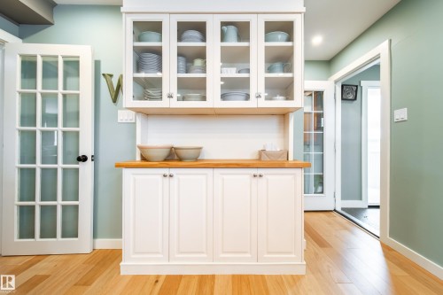 With specially built-in cabinets - 8332 120 Street, Edmonton, AB - Indoor Photo Showing Other Room