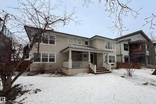 Home faces east with covered front veranda. With hardwood decking.  On the southwest roof there are 10-kilowatt solar panels - 8332 120 Street, Edmonton, AB - Outdoor