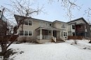 Home faces east with covered front veranda. With hardwood decking.  On the southwest roof there are 10-kilowatt solar panels - 8332 120 Street, Edmonton, AB  - Outdoor 