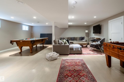 spacious lower level family room/ games room - 8332 120 Street, Edmonton, AB - Indoor Photo Showing Other Room