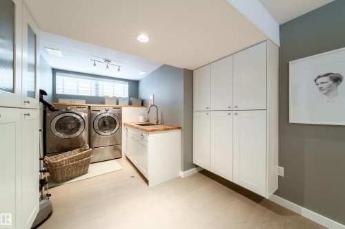 on lower level - 8332 120 Street, Edmonton, AB - Indoor Photo Showing Laundry Room