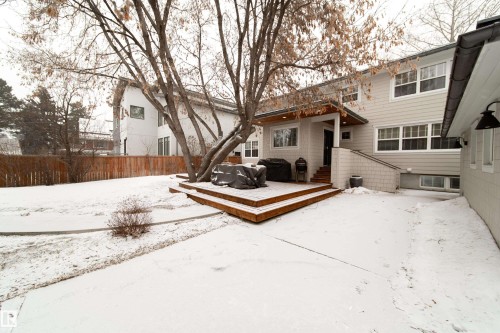 over 550 sq. ft of newer decking, notice soffit pot lighting. Wonderful central tree - 8332 120 Street, Edmonton, AB - Outdoor