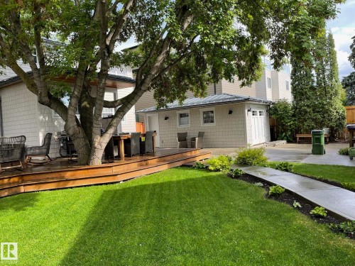 Separate from main house is this 22 x 12 ft. heated  studio with built in  shelving and bright lighting. This square footage is not included in over all sq. ft. of this 2,733 sq. ft. home - 8332 120 Street, Edmonton, AB - Outdoor With Exterior