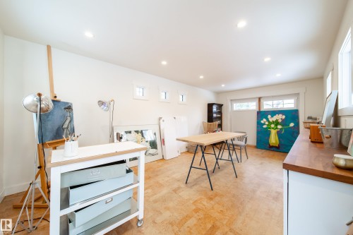 Heated stand alone studio which can be used for anything from a work out area, to a passionate private hobby work space. - 8332 120 Street, Edmonton, AB - Indoor