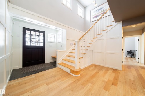 Front and back entrance with heated ceramic tile flooring.  Spacious area to welcome many guest at a time. - 8332 120 Street, Edmonton, AB - Indoor Photo Showing Other Room