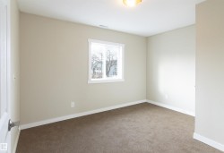 Unfurnished room with carpet floors and baseboards - 