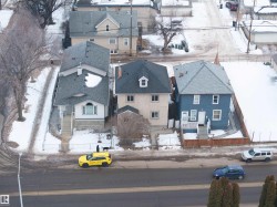Snowy aerial view featuring a residential view - 
