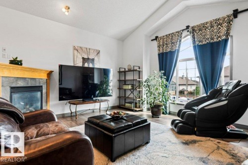 16820 57 Street, Edmonton, AB - Indoor Photo Showing Living Room With Fireplace