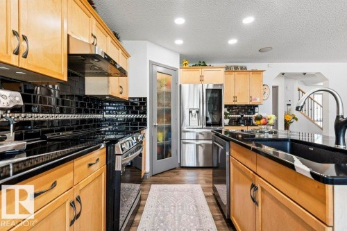 16820 57 Street, Edmonton, AB - Indoor Photo Showing Kitchen With Upgraded Kitchen