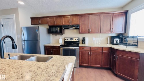 1542 33A Street, Edmonton, AB - Indoor Photo Showing Kitchen With Double Sink