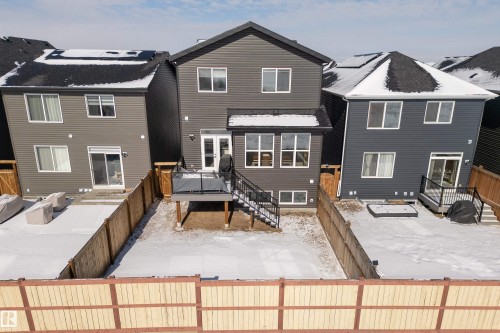 Back of house featuring a fenced backyard and a residential view - 19 Sturtz Place, Leduc, AB - Outdoor