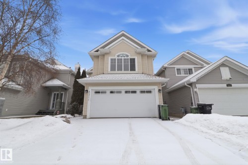 Traditional-style house featuring a garage - 8311 11 Avenue, Edmonton, AB - Outdoor With Facade
