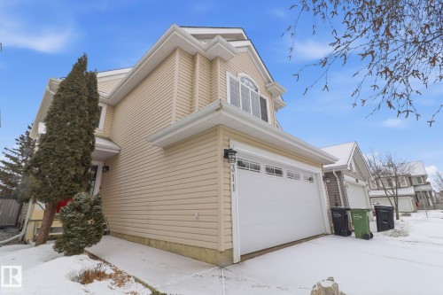 View of snow covered exterior featuring an attached garage - 8311 11 Avenue, Edmonton, AB - Outdoor