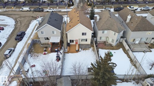 The property features a private backyard with a deck and fencing - 8311 11 Avenue, Edmonton, AB - Outdoor