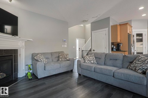 16 Hartwick Gate, Spruce Grove, AB - Indoor Photo Showing Living Room With Fireplace