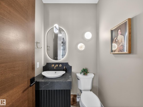 Bathroom with toilet and vanity - 7104 54 Avenue, Beaumont, AB - Indoor Photo Showing Bathroom