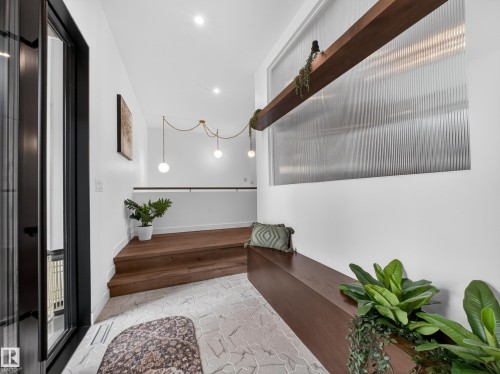 Corridor with recessed lighting and baseboards - 7104 54 Avenue, Beaumont, AB - Indoor Photo Showing Other Room