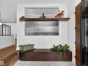 Detailed view of wood finished floors and baseboards - 7104 54 Avenue, Beaumont, AB  - Indoor Photo Showing Other Room 