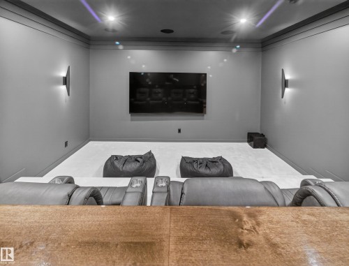 View of carpeted home theater - 7104 54 Avenue, Beaumont, AB - Indoor