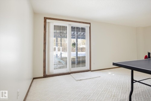 Game room featuring light carpet and baseboards - 83 Bellevue Crescent, St. Albert, AB - Indoor Photo Showing Other Room