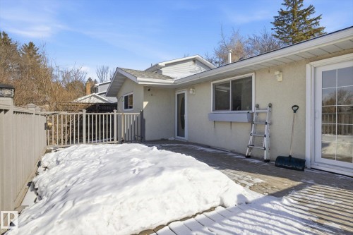 Exterior space with stucco siding and a wooden deck - 83 Bellevue Crescent, St. Albert, AB - Outdoor With Exterior
