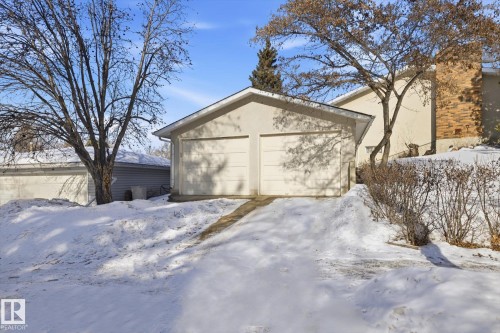 Snow covered garage with a detached garage - 83 Bellevue Crescent, St. Albert, AB - Outdoor