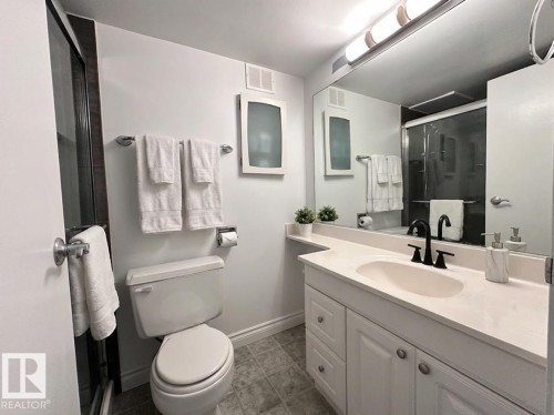Full bathroom with vanity and a shower stall - 1401 10883 Saskatchewan Drive, Edmonton, AB - Indoor Photo Showing Bathroom