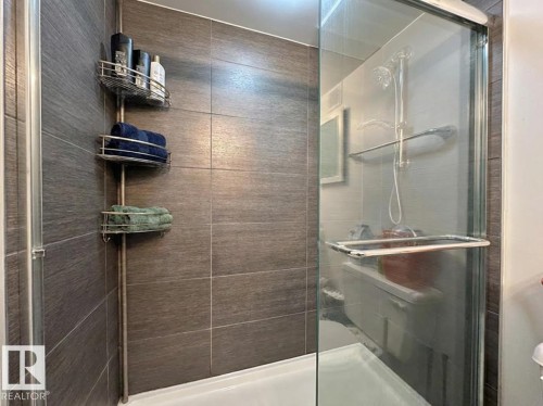 Bathroom with a stall shower - 1401 10883 Saskatchewan Drive, Edmonton, AB - Indoor Photo Showing Bathroom